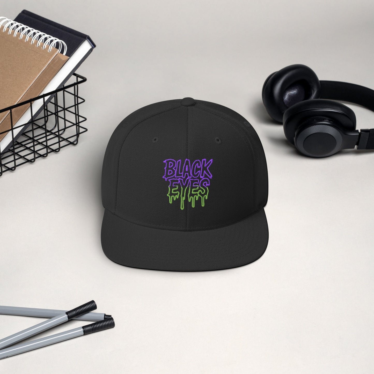 Black Eyes Snapback Hat